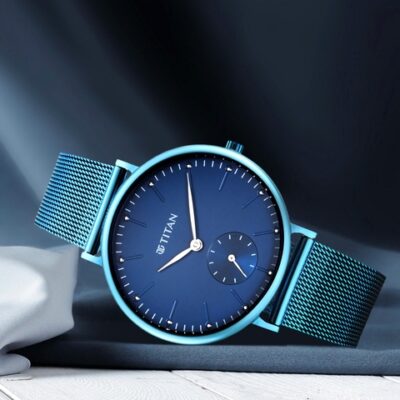 Titan Women Blue Brass Dial & Blue Bracelet Style Straps Analogue Watch [95142QM01-Blue]